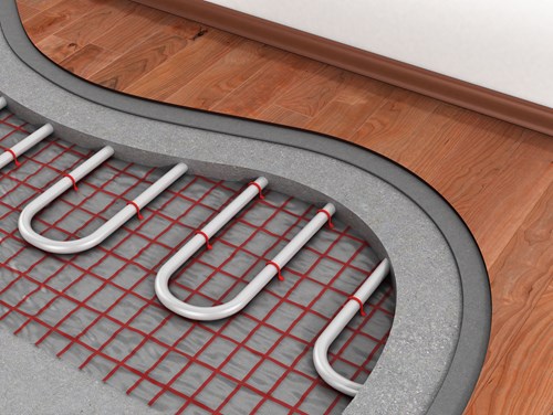Wooden flooring open to reveal underfloor heating pipes
