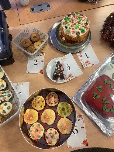 Festive holiday treats and cakes at a Swale Heating office bake-off competition