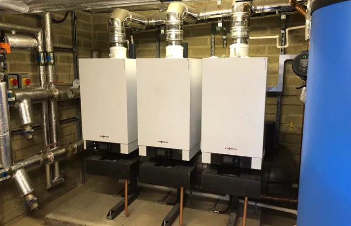 Three boilers side-by-side in plantroom